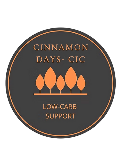 Cinnamon Days CIC logo, brown circle with orange leaf-shaped trees and Low Carb Support text