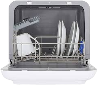 Small white table top dishwasher with the door open containing mugs and plates